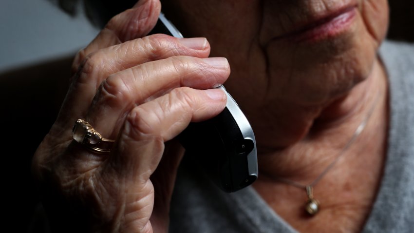 ILLUSTRATION – 11 October 2019, Bavaria, Würzburg: An elderly woman is using a cordless landline phone. Photo: Karl-Josef Hildenbrand/dpa (Photo by Karl-Josef Hildenbrand/picture alliance via Getty Images)