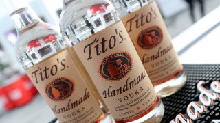 Tito's Vodka bottles on a table