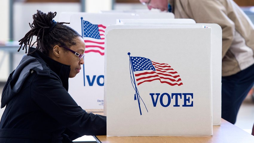 people vote in the Super Tuesday primary election