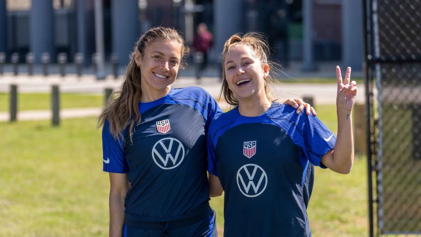 Sofia Huerta and Ashley Sanchez of the United States enter the field before a training session at the UCF training fields on February 7, 2023 in Orlando, Florida.