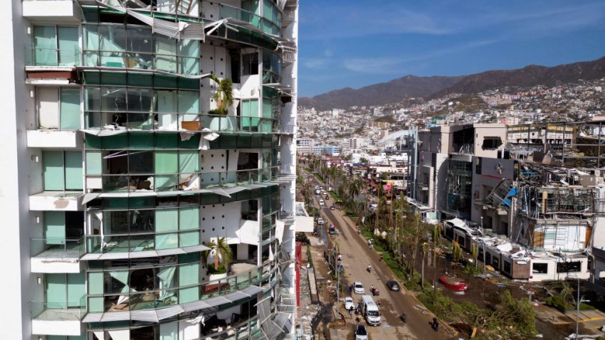 TOPSHOT – View of a building partially destroyed after the passage of Hurricane Otis in Acapulco, Guerrero State, Mexico, on October 26, 2023. Hurricane Otis caused at least 27 deaths and major damage as it lashed Mexico’s resort city of Acapulco as a scale-topping category 5 storm, officials said Thursday, in what residents called a “total disaster.” Otis crashed into Acapulco with furious winds of 165 miles (270 kilometers) per hour, shattering windows, uprooting trees and largely cutting off communications and road links with the region. (Photo by RODRIGO OROPEZA / AFP) (Photo by RODRIGO OROPEZA/AFP via Getty Images)