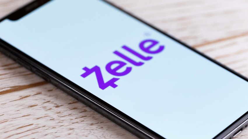 Russia, Kazan Apr 1, 2020: Zelle Apple Application Apps on Iphone Screen on a Rustic White Wooden Table. Zelle is a United States-based digital payments network. #Zelle