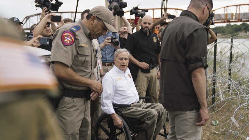 Greg Abbott, governor of Texas, tours the border between the US and Mexico along the Rio Grande River in Eagle Pass, Texas, US, on Monday, May 23, 2022. A Louisiana federal judge blocked the Biden administration on Friday from ending Title 42a pandemic-related border restriction that allows for the immediate expulsion of asylum-seekers and other migrants. Photographer: Eric Thayer/Bloomberg via Getty Images