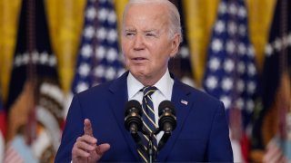 President Joe Biden speaks in the East Room at the White House in Washington.