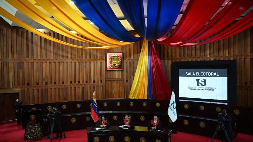 Venezuelan Supreme Court of Justice (TSJ) President Caryslia Rodriguez (C) delivers a statement by the Supreme Court of Venezuela on the results of the country’s presidential election at the TSJ building in Caracas on August 22, 2024. Venezuela’s Supreme Court, which observers say is loyal to the government of President Nicolas Maduro, on Thursday declared him the winner of the disputed July 28 election amid opposition claims of widespread vote fraud. (Photo by Federico PARRA / AFP) (Photo by FEDERICO PARRA/AFP via Getty Images)