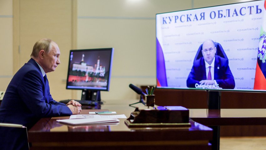 In this pool photograph distributed by Russian state owned Sputnik agency, Russia’s President, Vladimir Putin (L) attends a remote meeting with Kursk Region Governov, Alexei Smirnov via video call in Moscow, on August 8, 2024. Russian forces are still facing a major incursion by Ukrainian troops on their soil, in the Kursk border region, on August 8, 2024, an unexpected setback for the Kremlin whose army was to its advantage until then on the front. (Photo by Gavriil GRIGOROV / POOL / AFP) / Editor’s note : this image is distributed by Russian state owned agency Sputnik (Photo by GAVRIIL GRIGOROV/POOL/AFP via Getty Images)