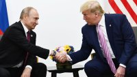 US President Donald Trump (R) attends a meeting with Russia’s President Vladimir Putin during the G20 summit in Osaka on June 28, 2019. (Photo by Brendan Smialowski / AFP) (Photo by BRENDAN SMIALOWSKI/AFP via Getty Images)