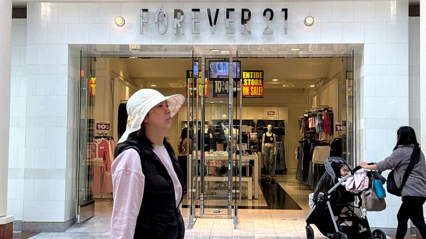 SAN FRANCISCO, CALIFORNIA – FEBRUARY 20: A pedestrian walks by a Forever 21 store that is preparing to close on February 20, 2025 in San Francisco, California. Clothing retailer Forever 21 is set to close 200 stores as the company searches for a buyer and considers a second bankruptcy filing. Forever 21 could have to liquidate its entire chain of nearly 350 stores if no buyer emerges. (Photo by Justin Sullivan/Getty Images)