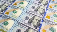 The background of money from the American national currency. US$ 100 bills. Economics, business and finance. Background of cash hundred dollar bills. Paper money.