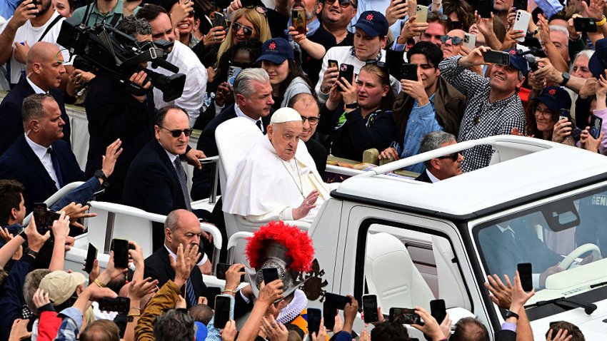 TOPSHOT – Pope Francis waves to the crowd from the popemobile after the Easter mass, at St Peter’s square in the Vatican on April 20, 2025. (Photo by Tiziana FABI / AFP) (Photo by TIZIANA FABI/AFP via Getty Images)