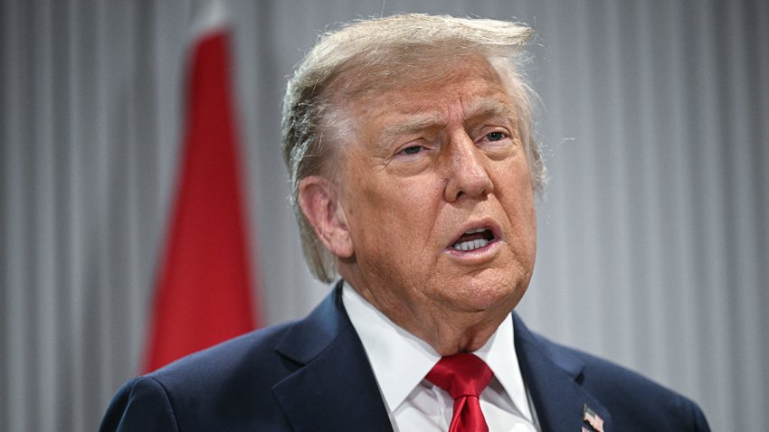 US President Donald Trump speaks to the press as he meets Canadian Prime Minister Mark Carney during the Group of Seven (G7) Summit at the Pomeroy Kananaskis Mountain Lodge in Kananaskis, Alberta, Canada on June 16, 2025.  (Photo by Brendan SMIALOWSKI / AFP) (Photo by BRENDAN SMIALOWSKI/AFP via Getty Images)