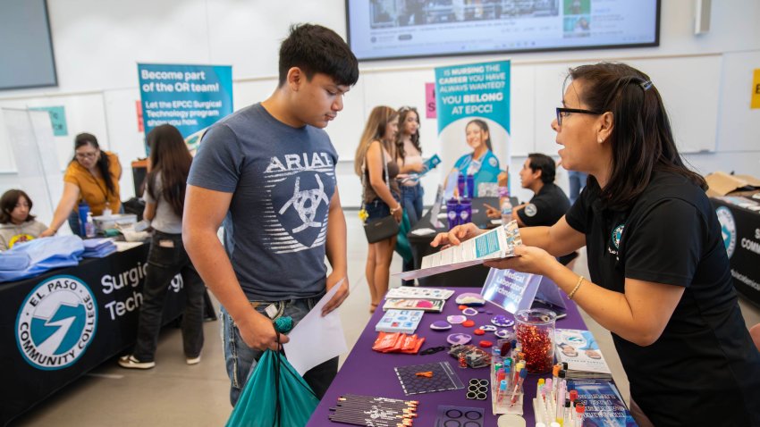 Nicholas Roiero get information on EPCC’s Medical Lab Program from Veronica Domiguez at the First Year Experience event Friday.