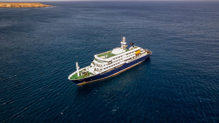 This aerial picture shows a general view of the cruise ship MV Hondius stationary off the port of Praia, the capital of Cape Verde, on May 3, 2026. An outbreak of "severe acute respiratory illness" on board a cruise ship in the Atlantic has left two people dead and a third in intensive care in Johannesburg, South Africa’s health ministry told AFP on May 3, 2026.
The outbreak occurred on the MV Hondius, travelling from Ushuaia in Argentina to Cape Verde. The patient being treated in Johannesburg tested positive for a hantavirus, a family of viruses that can cause hemorrhagic fever, South African spokesperson Foster Mohale said. (Photo by AFP via Getty Images)